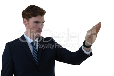 Businessman pretending to use an invisible screen