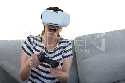 Woman playing video game with virtual reality headset