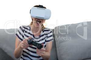Woman playing video game with virtual reality headset