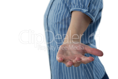 Female executive pretending to hold an invisible object