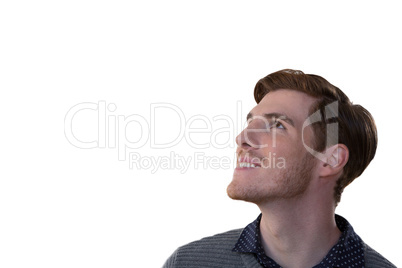 Male executive standing against white background