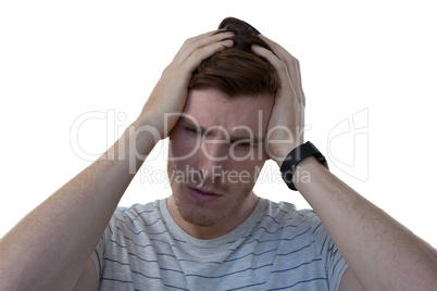 Male executive standing against white background