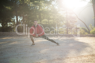 Portrait of man exercising in park