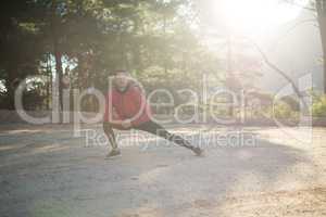 Portrait of man exercising in park