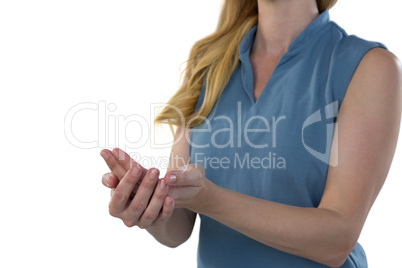 Female executive pretending to hold an invisible object