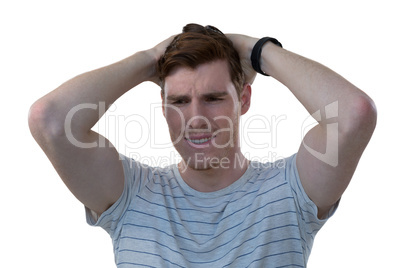 Male executive standing against white background