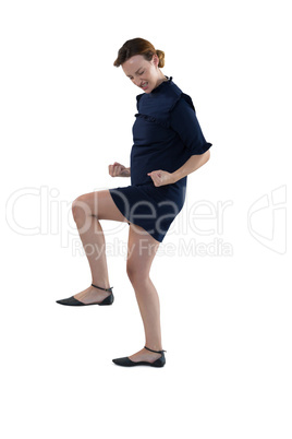 Female executive dancing against white background