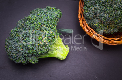 fresh cabbage broccoli on a black background