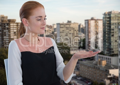 Businessman with hand palm open in city