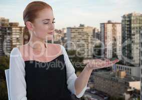 Businessman with hand palm open in city