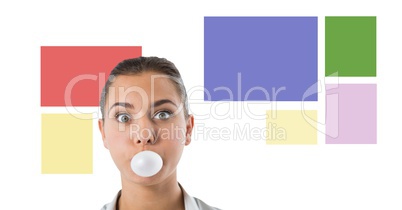 Businesswoman with colorful minimal shapes blowing gum
