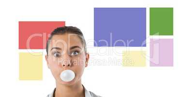 Businesswoman with colorful minimal shapes blowing gum