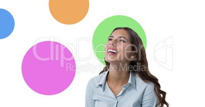 Businesswoman laughing with colorful circles