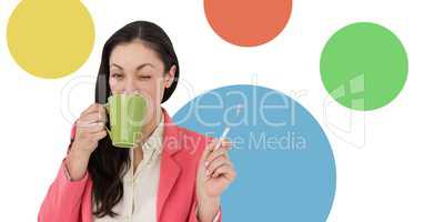 Woman drinking tea with colorful circles