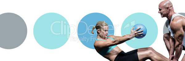Fitness trainer man with minimal shapes training woman