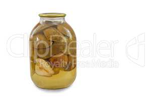 Canned pear in glass jar on white background.