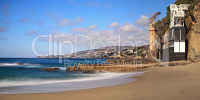 Tower over Rocky shores at Victoria Beach in Laguna Beach