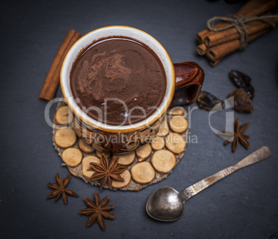 hot chocolate in a brown mug