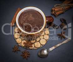 hot chocolate in a brown mug