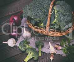 fresh broccoli in a brown wicker basket