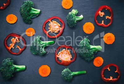 pieces of fresh cabbage broccoli, carrots and red peppers