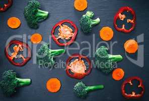 pieces of fresh cabbage broccoli, carrots and red peppers