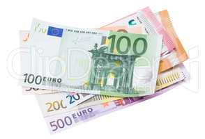 Euro banknotes on white background.