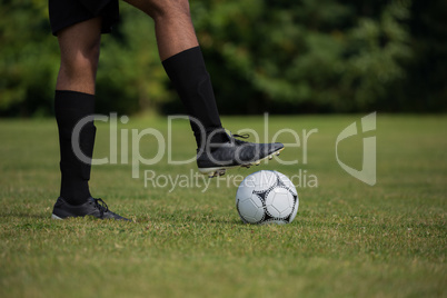 Football player ready to kick the soccer ball