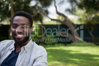 Man relaxing in garden