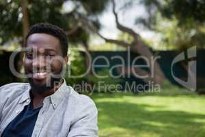 Man relaxing in garden