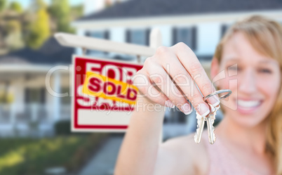 Excited Woman Holding House Keys and Sold For Sale Real Estate S