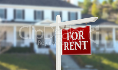 For Rent Real Estate Sign In Front of Beautiful House