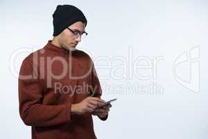 Man in winter cloth using mobile phone