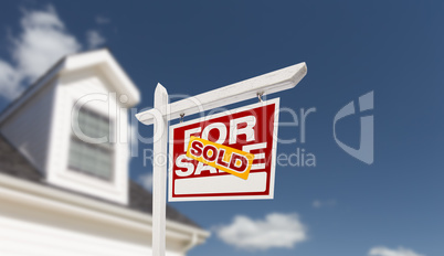 Sold Home For Sale Real Estate Sign in Front of Beautiful New Ho
