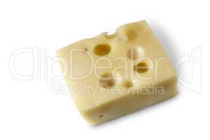 A piece of cheese on a white background