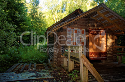 wooden Orthodox Church in the forest in summer