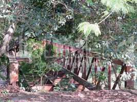 Abandoned iron bridge in the middle of the woods