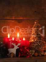 Romantic Christmas background with four candles