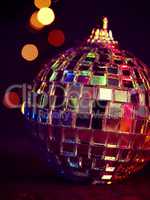 Disco Christmas bauble with blurred lights