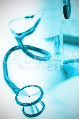 Composite image of blue stethoscope