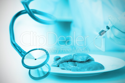 Composite image of blue stethoscope