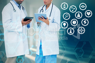 Composite image of doctors discussing something on clipboard