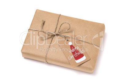 Christmas gift box wrapped in kraft paper.