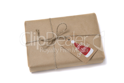 Christmas gift box wrapped in kraft paper.