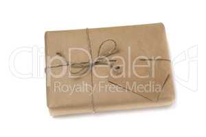 Christmas or New Year gift box wrapped in kraft paper with blank