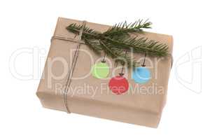 Christmas gift box wrapped in kraft paper.