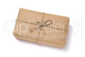 Christmas gift box wrapped in kraft paper.