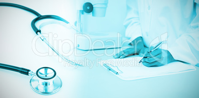 Composite image of metal black stethoscope