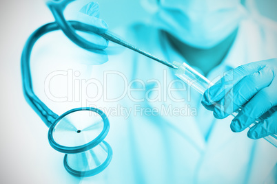 Composite image of blue stethoscope