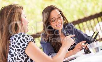 Expressive Young Adult Girlfriends Using Their Computer Electron